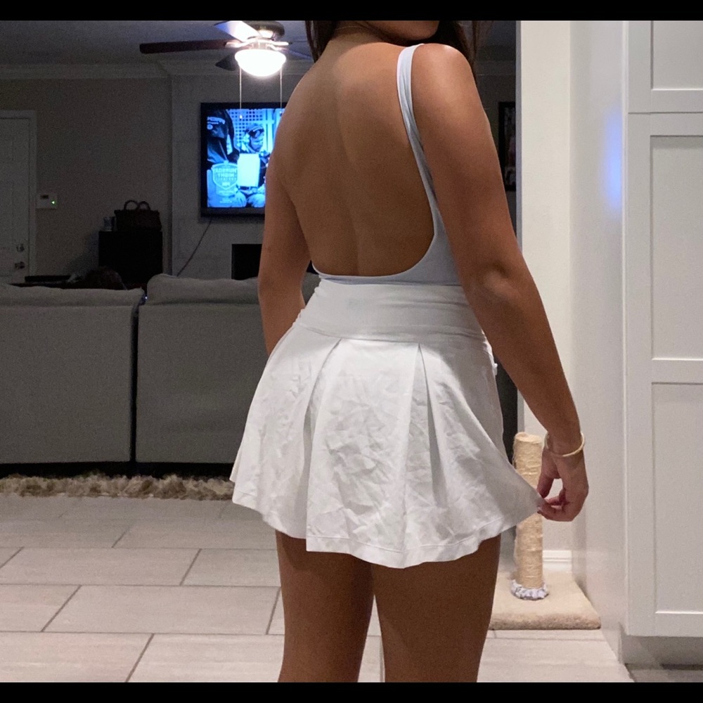 Backless light blue body suit